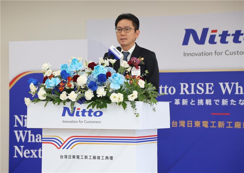Nitto Denko Corporation President and Representative Director Tatsuya Akagi delivers remarks. 